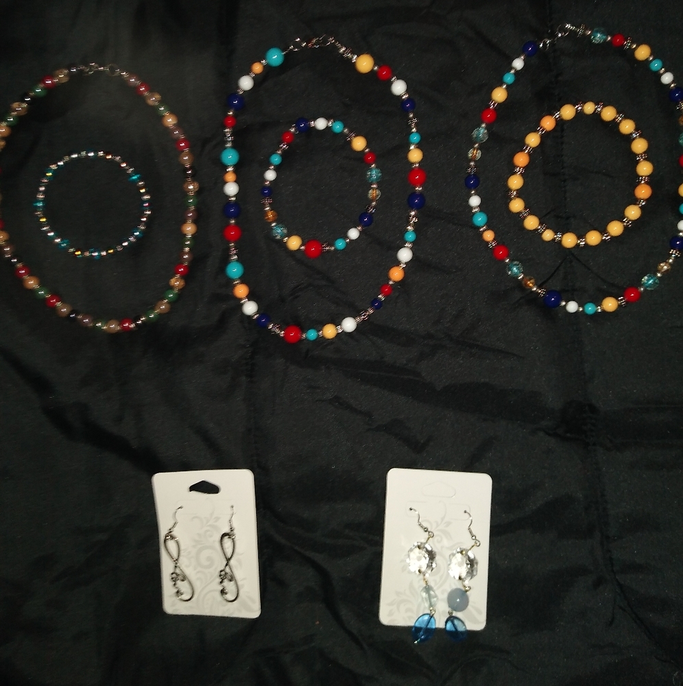 Beaded necklace, earrings, and bracelet.yellow